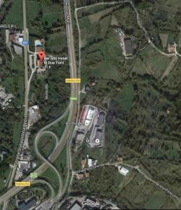a map of a road with a red spot at Bel Sito Hotel Due Torri in Manocalzati