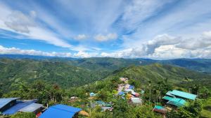a view of a village in the mountains at Kiau View Cabin in Kota Belud
