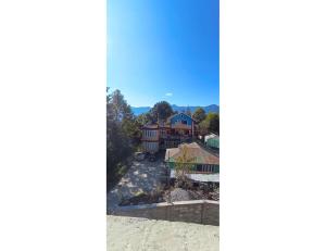 a view from the roof of a house at Ngima woizer Homestay,Tawang in Tawang