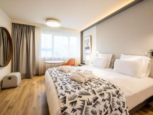 Katil atau katil-katil dalam bilik di Mercure Marseille Centre Prado Vélodrome +90 gambar