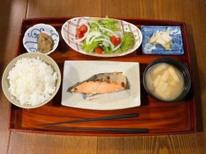 a tray of food with rice and fish and vegetables at Mihamakan, Izu Oshima - Vacation STAY 89849v in Oshima