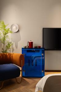 TV a/nebo společenská místnost v ubytování Li'an Designer Hotel, Jiefangbei Pedestrian Street, Shibati + 34 fotografií