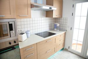 Kuchyň nebo kuchyňský kout v ubytování Villas Coloradas