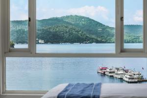 a view from a window of boats in the water at Shui Yang Lakeview House with Elevator in Yuchi