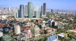 an aerial view of a city with tall buildings at Jeamco Royal Hotel - Pasig in Manila