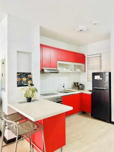 Η κουζίνα ή μικρή κουζίνα στο Unit G04 magallanes residences Davao city