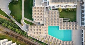 an overhead view of a building with a swimming pool at Blue Sea Island in Kolimbia