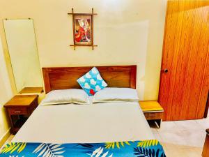 Ένα ή περισσότερα κρεβάτια σε δωμάτιο στο Tropical VIBES RETREAT +23 φωτογραφίες