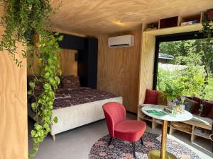 Posezení v ubytování Natuurhuisjes Westerwolde + 27 fotografií