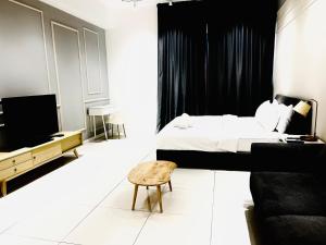 Postel nebo postele na pokoji v ubytování KLCC Chamber Suites + 53 fotografií