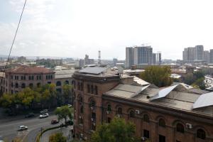 a view of the city from the roof of a building at Loft Apartment in the heart of Yerevan in Yerevan