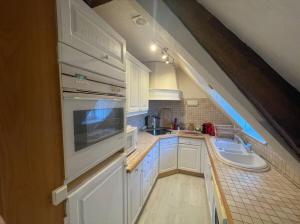 Kuchyň nebo kuchyňský kout v ubytování Saint Malo 360