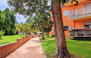 a sidewalk in front of a building at Last Minute Booking in Peschiera del Garda