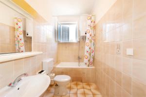Koupelna v ubytování Apartments Bepina