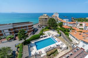 an aerial view of a city with a swimming pool at Résidence Vacances Bleues Le Grand Large in Biarritz