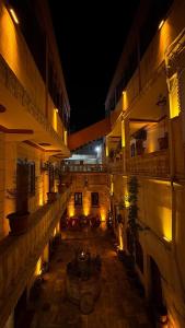 an empty courtyard of a building at night at Grand Babil Otel in Sanlıurfa