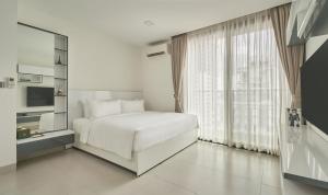 Gambar di galeri bagi Noden Hotel & Apartment di Phnom Penh +88 gambar