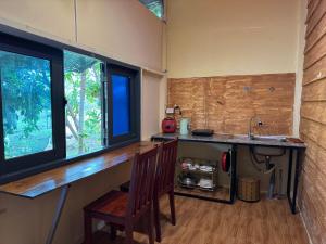 Η κουζίνα ή μικρή κουζίνα στο Tina Bungalow +52 φωτογραφίες