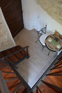 an overhead view of a room with a table and chairs at B&B Foresteria Della Certosa in Collepardo