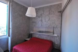 Postel nebo postele na pokoji v ubytování Albergo La Vela