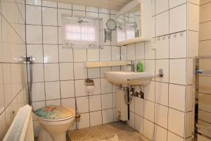 Koupelna v ubytování Kieke Wiet + 17 fotografií