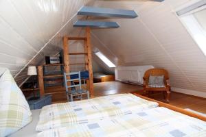 Postel nebo postele na pokoji v ubytování Kieke Wiet