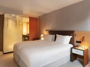 Postel nebo postele na pokoji v ubytování Sofitel Luxembourg Le Grand Ducal + 180 fotografií