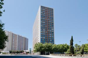 a rendering of a tall building at Expo Studio in Lisbon