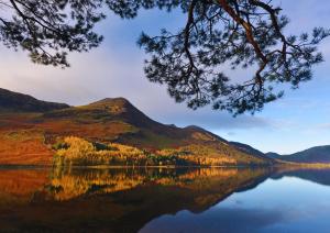 a view of a lake with a mountain in the background at Buttermere Court Hotel in Buttermere