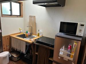 Imagem da galeria de 築150年の古民家ゲストハウスひとたび em Iwaki