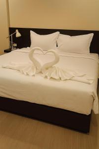 Postel nebo postele na pokoji v ubytování Appartement 2 Chambres Tropical Sûr et Économique + 2 fotografie