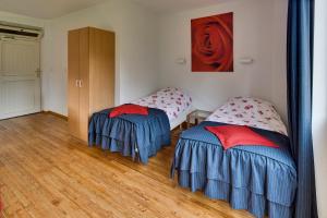 Postel nebo postele na pokoji v ubytování Lokven Hoeve