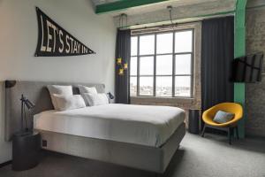 Ένα ή περισσότερα κρεβάτια σε δωμάτιο στο The Social Hub Maastricht +29 φωτογραφίες