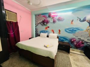 Postel nebo postele na pokoji v ubytování Hotel Blue Light - Sakrt Metro + 15 fotografií