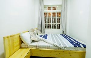 Postel nebo postele na pokoji v ubytování Roselune Home