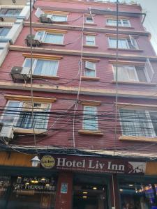 a red building with a hotel la inn at Hotel Liv Inn in Kathmandu
