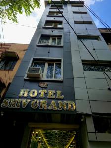 a building with a sign that reads hotel sky channel at Hotel Shiv Grand SV in Kānpur
