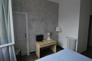 Postel nebo postele na pokoji v ubytování Albergo La Vela