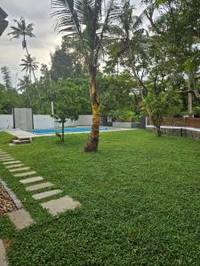 Bazén v ubytování The Outhouse Villa with Pool Alleppey nebo v jeho okolí