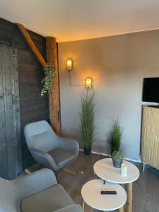 TV a/nebo společenská místnost v ubytování B&B Herberg Foestrum