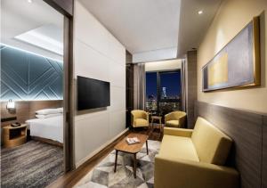 TV a/nebo společenská místnost v ubytování Sunway Hotel Big Box