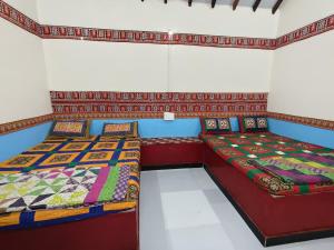 Postel nebo postele na pokoji v ubytování Rann bhumi villa