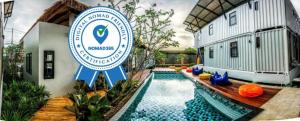 a sign for a villa with a swimming pool at Us Hostel Samui in Bophut +58 photos