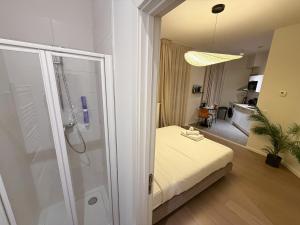 Ένα ή περισσότερα κρεβάτια σε δωμάτιο στο Studio 402 Avenue Louise