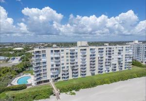 an aerial view of a large apartment building at Ocean Walk 506 in Indian Harbour Beach