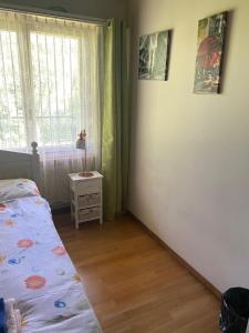 Ένα ή περισσότερα κρεβάτια σε δωμάτιο στο City Room