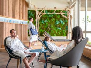 a group of people sitting in chairs in a room at Mercure Thalasso & Spa Port Fréjus in Fréjus