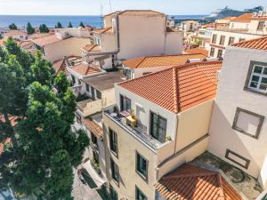 an aerial view of a city with buildings at Tanoeiros Residence by An Island Apart in Funchal +129 photos