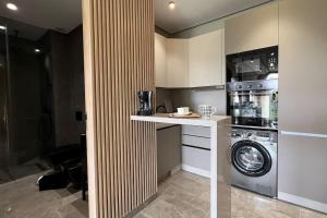 Η κουζίνα ή μικρή κουζίνα στο Casa The Address - By AppartAli +14 φωτογραφίες