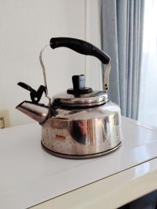 a tea kettle sitting on top of a counter at Seaside Villa Matsugaya - Vacation STAY 19447 in Sammu